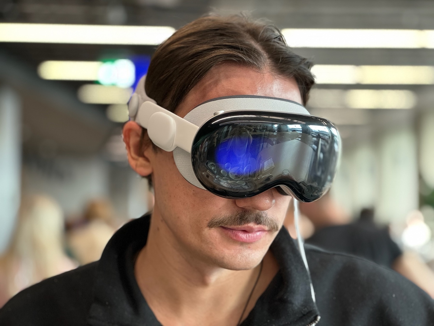 A team member trying a mixed reality headset